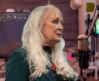 Dana Brown speaking at podcast