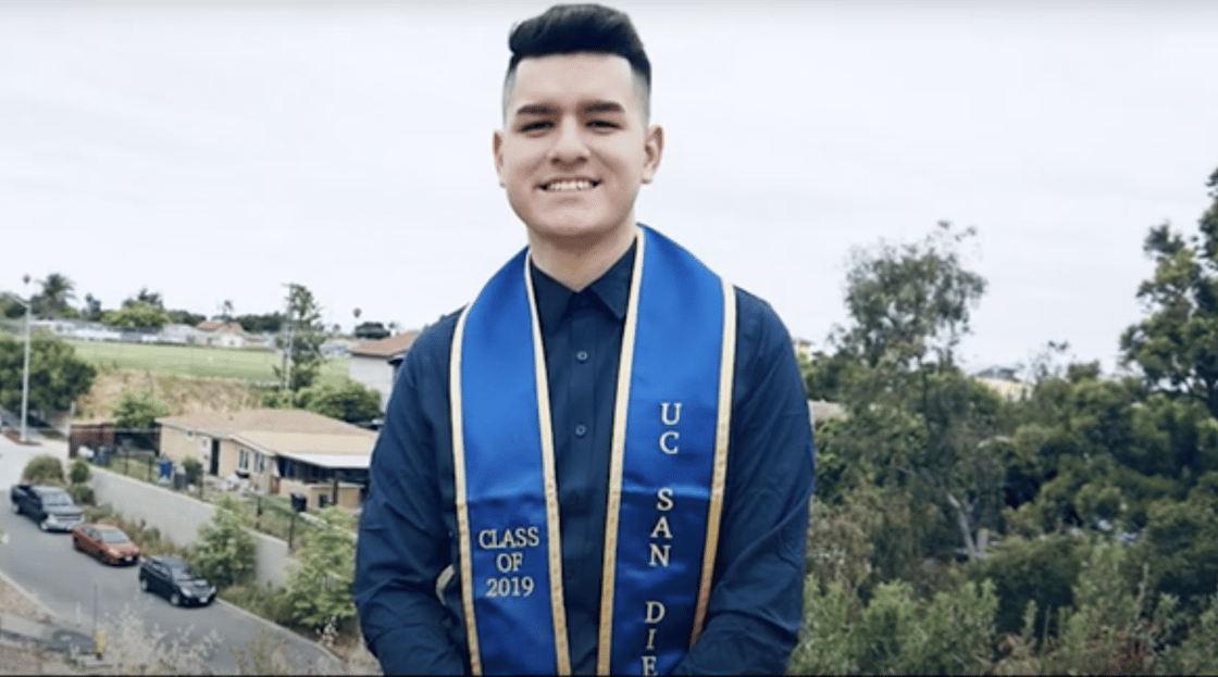 Rudy in graduation gown from UCSD